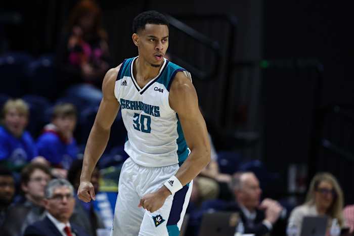 North Carolina-Wilmington Seahawks guard Jaylen Sims (30) celebrates after a play against the Delaware Fightin Blue Hens during the first half of the Colonial Conference Championship game at Entertainment and Sports Arena.